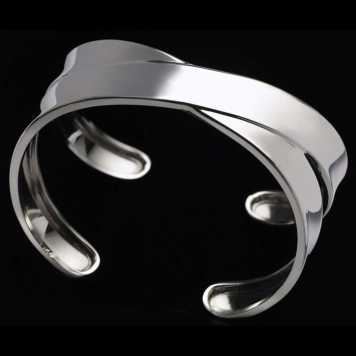 Castor Silver Crossover Bangle - Corazon Latino