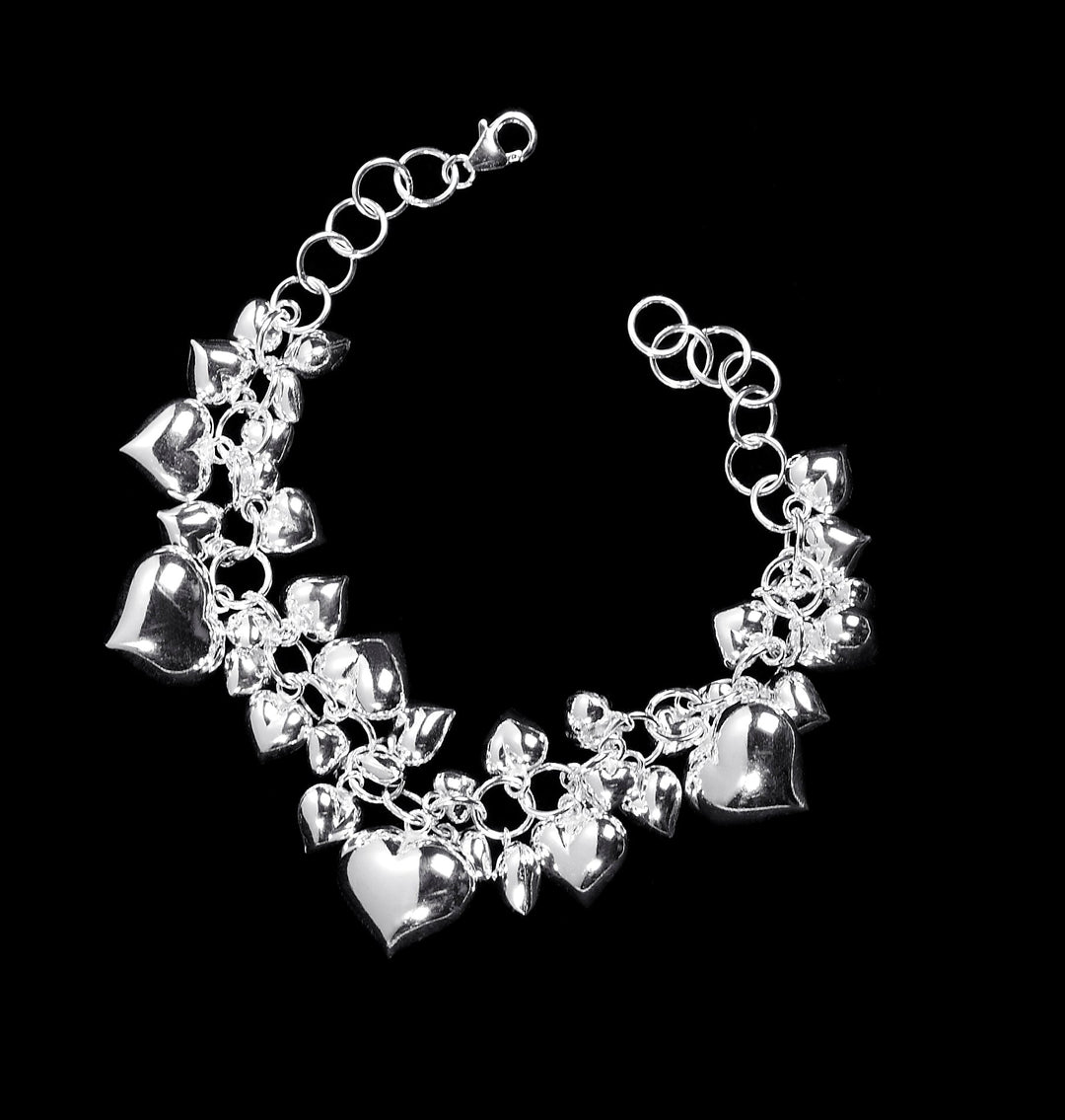 Cupid Silver Hearts Earrings - Corazon Latino